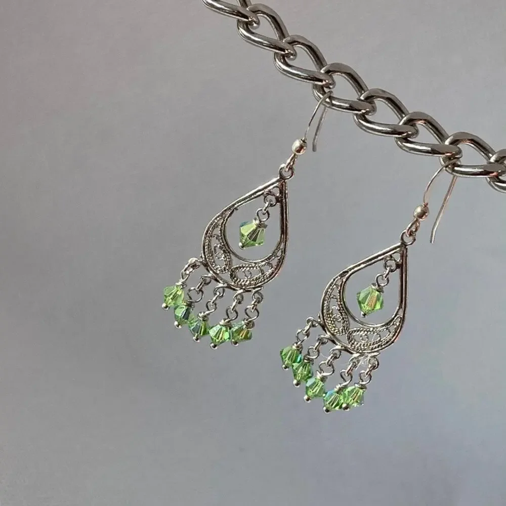 Delicate silver tone and leaf green chandelier earrings